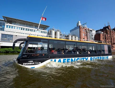 Amphibious vehicle driving through HafenCity before entering the water