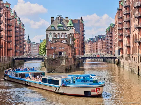 Barkasse boat on a Hamburg harbor and Speicherstadt day cruise
